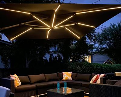 corliving patio umbrella with solar power led lights OVIOS 10 ft Offset Shade Coverage WESTLAKE 9 Ft Solar LED